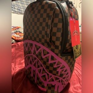 New spray ground bag